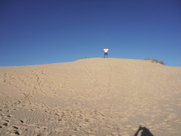 Lee at the top of the same sand hill